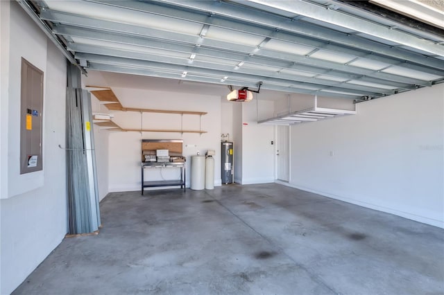 garage with a garage door opener, electric panel, and water heater