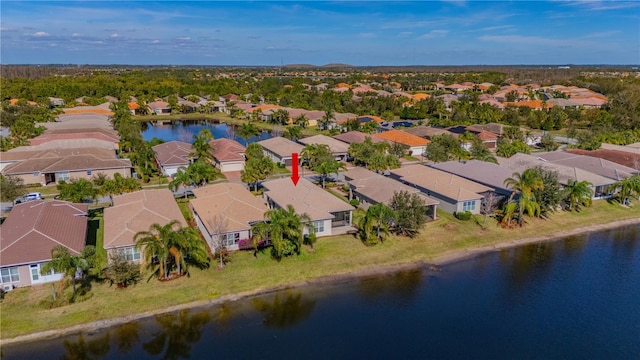 drone / aerial view with a water view