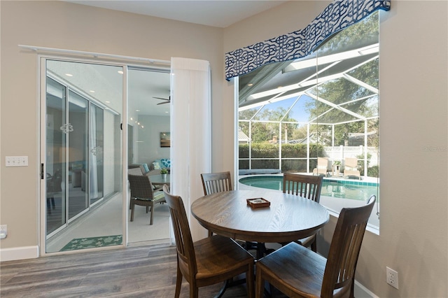 dining room with hardwood / wood-style floors