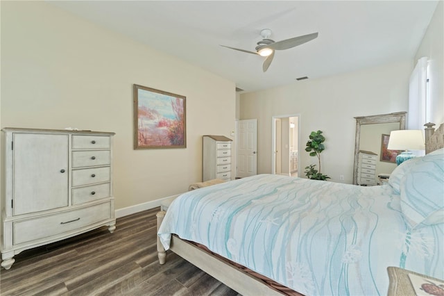 bedroom with ceiling fan and dark hardwood / wood-style floors