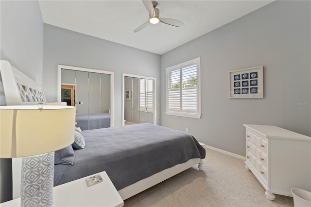 bedroom featuring ceiling fan and a textured ceiling