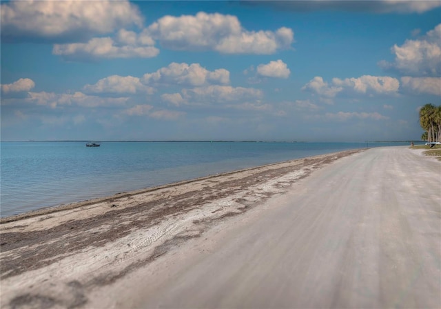 property view of water with a beach view