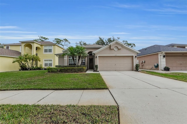 view of front of house featuring a garage and a front yard