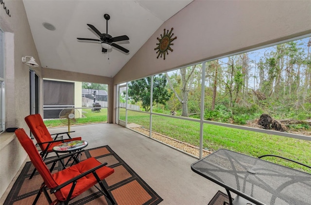 sunroom / solarium with vaulted ceiling and ceiling fan