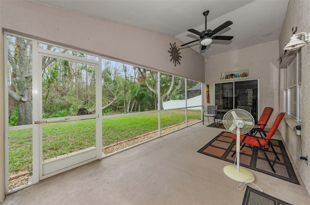 sunroom featuring a healthy amount of sunlight and ceiling fan