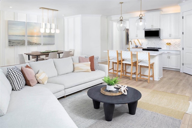 living room with light hardwood / wood-style floors