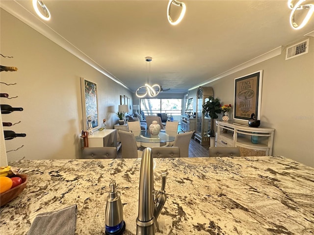 dining room with crown molding