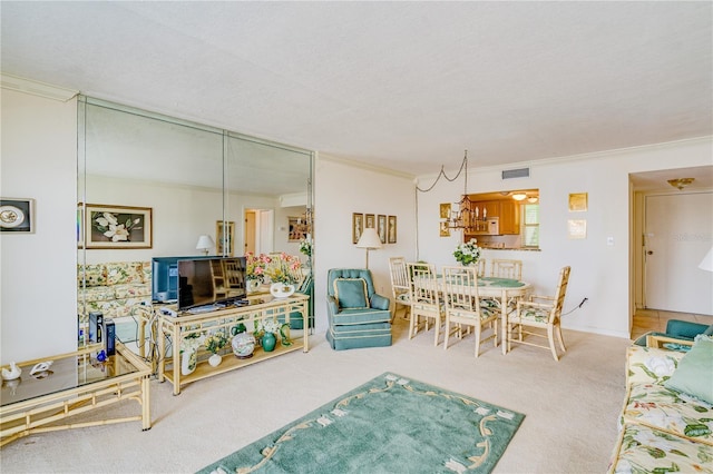 carpeted living room featuring ornamental molding