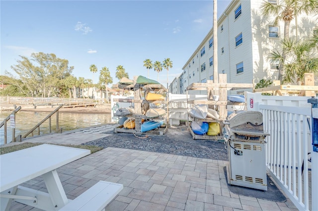 view of patio / terrace featuring a water view