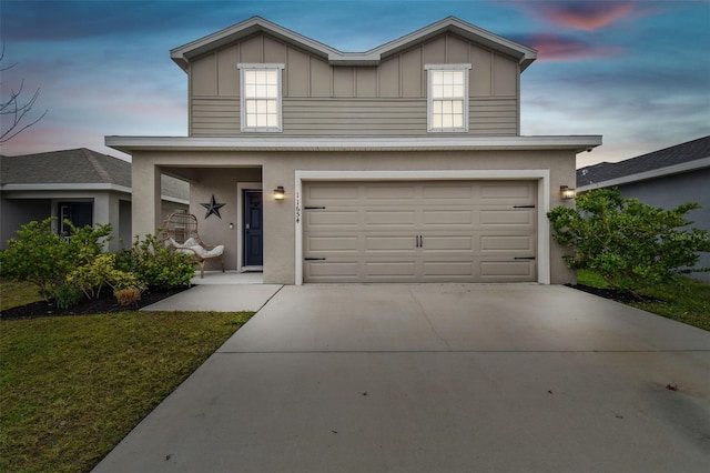 view of front of home with a garage