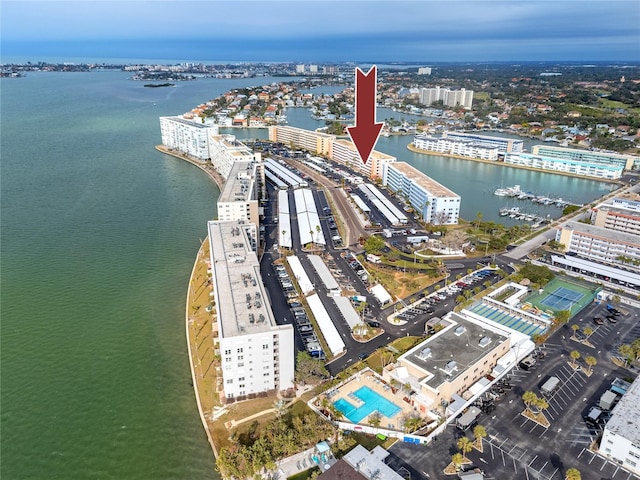 birds eye view of property featuring a water view