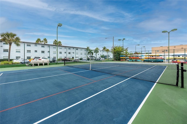 view of sport court featuring basketball hoop