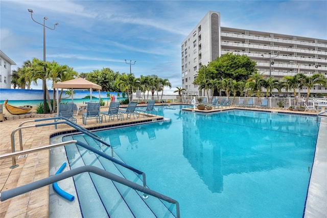 view of swimming pool featuring a gazebo