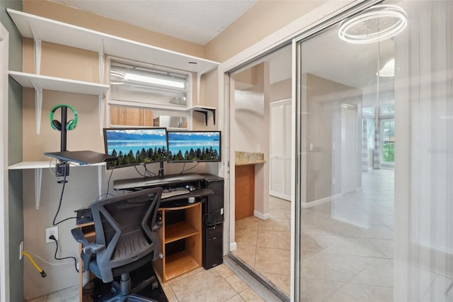 office area with light tile patterned floors