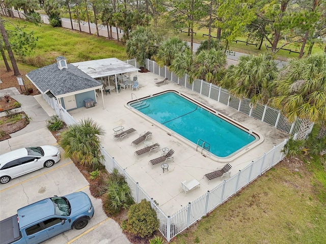 view of swimming pool with a patio area