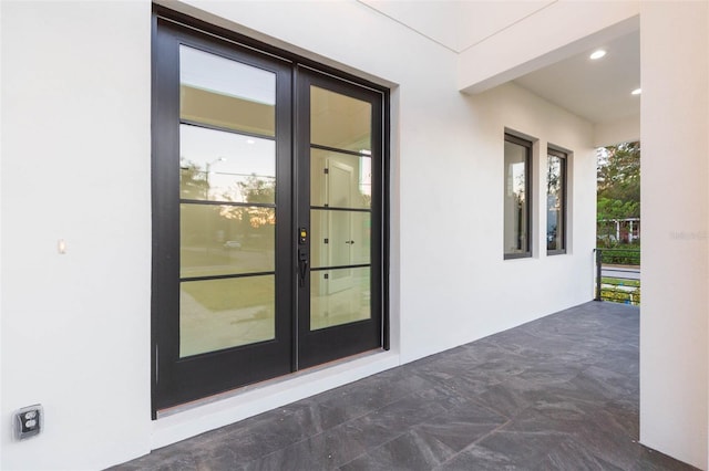 doorway to property featuring french doors