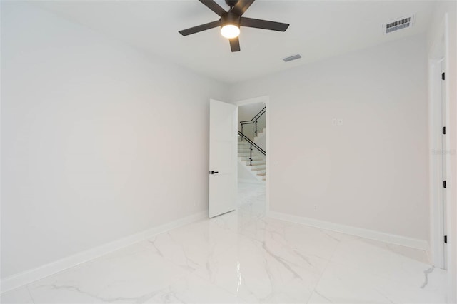 unfurnished room featuring ceiling fan