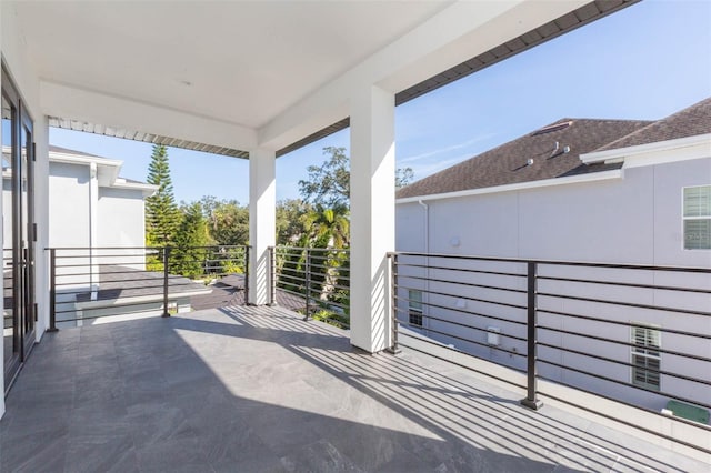 view of patio / terrace with a balcony