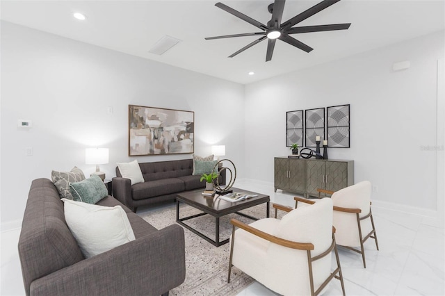 716 S Lois Ave, Tampa, FL 33609 - living room with a ceiling fan, baseboards, recessed lighting, and light marble finish flooring