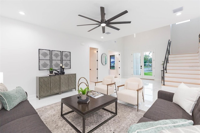 716 S Lois Ave, Tampa, FL 33609 - living room with stairway, a ceiling fan, recessed lighting, and baseboards