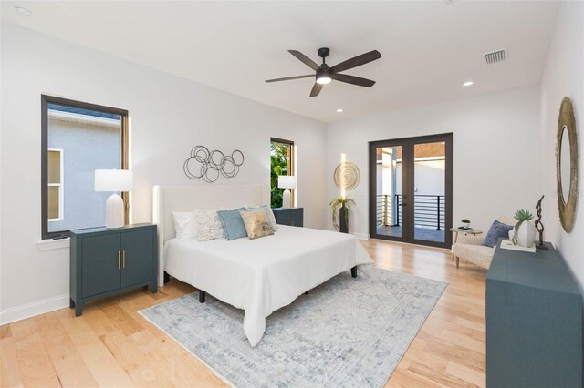 716 S Lois Ave, Tampa, FL 33609 - bedroom featuring french doors, light wood-style floors, access to outside, recessed lighting, and a ceiling fan