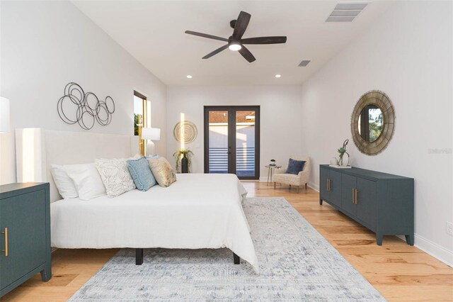 716 S Lois Ave, Tampa, FL 33609 - bedroom with light wood-type flooring, french doors, recessed lighting, baseboards, and ceiling fan