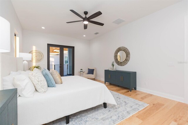 716 S Lois Ave, Tampa, FL 33609 - bedroom with light wood-type flooring, baseboards, recessed lighting, and a ceiling fan