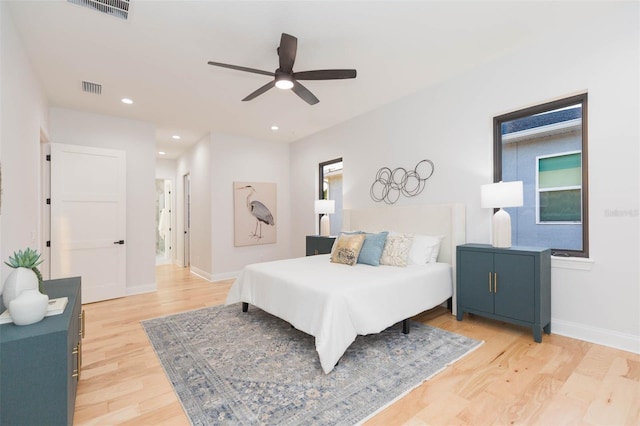 716 S Lois Ave, Tampa, FL 33609 - bedroom with light wood-style flooring, baseboards, recessed lighting, and ceiling fan