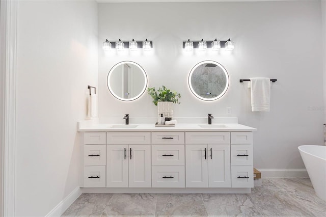 716 S Lois Ave, Tampa, FL 33609 - full bath with marble finish floors, baseboards, and double vanity