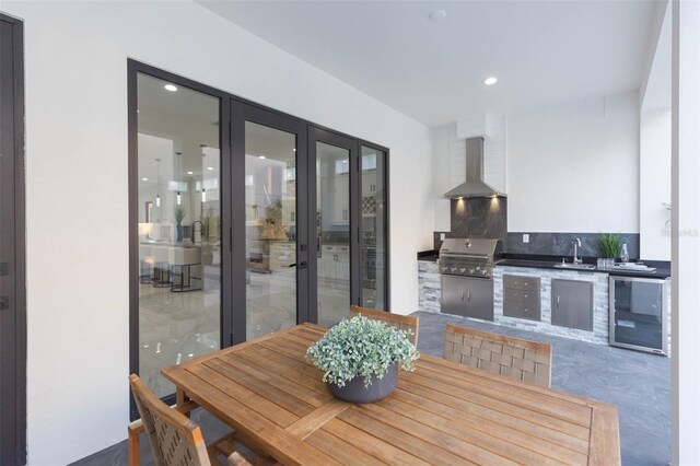 716 S Lois Ave, Tampa, FL 33609 - dining area featuring beverage cooler, french doors, and recessed lighting