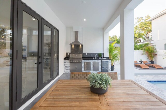 716 S Lois Ave, Tampa, FL 33609 - view of patio / terrace featuring wine cooler and a sink