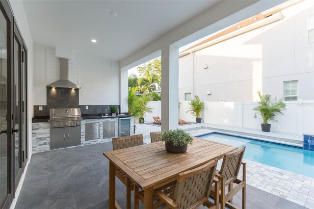 716 S Lois Ave, Tampa, FL 33609 - view of patio featuring outdoor dining space and a sink