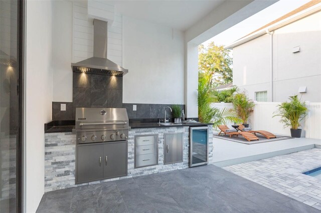 716 S Lois Ave, Tampa, FL 33609 - view of patio / terrace featuring wine cooler and a sink