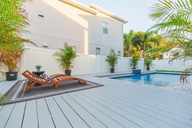 716 S Lois Ave, Tampa, FL 33609 - view of swimming pool featuring a fenced backyard and a deck