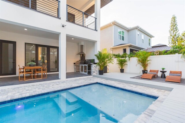 716 S Lois Ave, Tampa, FL 33609 - view of pool featuring an outdoor kitchen and a patio area