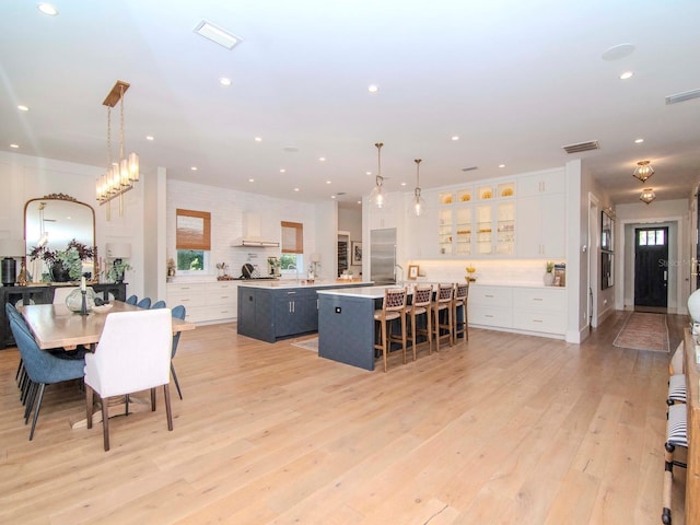 dining area with light wood-type flooring