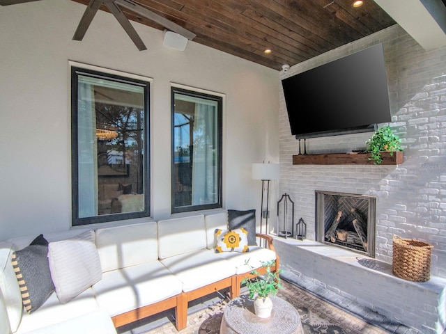 view of patio / terrace with an outdoor brick fireplace