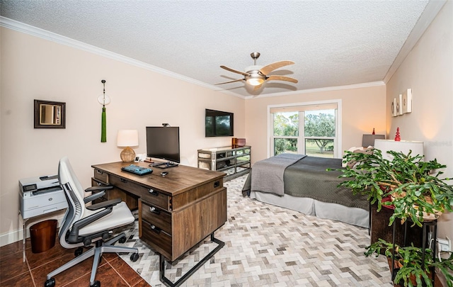 tiled office space with a textured ceiling, ceiling fan, and crown molding