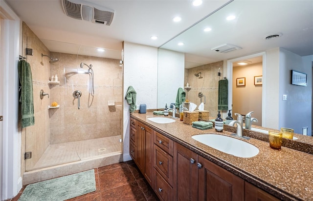 bathroom with an enclosed shower and vanity