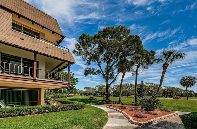 view of community featuring a lawn