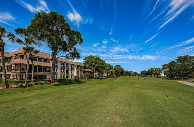 view of community with a lawn