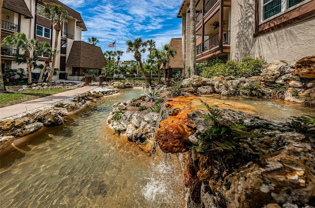 view of community featuring a water view