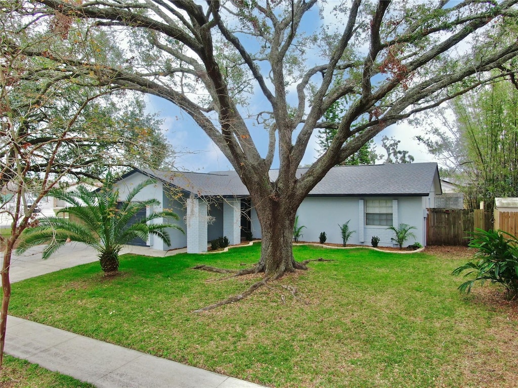 view of front of house with a front lawn