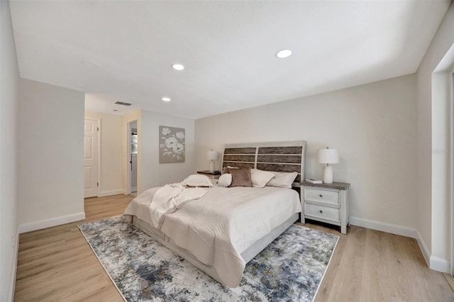 bedroom with light hardwood / wood-style flooring