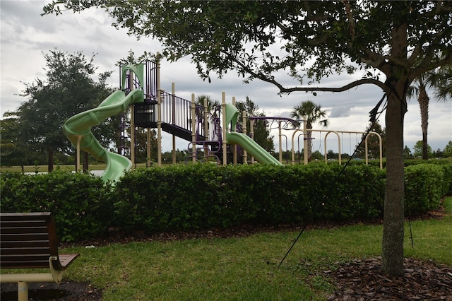 view of playground with a yard