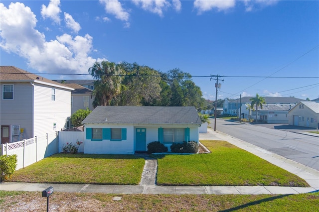 view of front of property with a front lawn