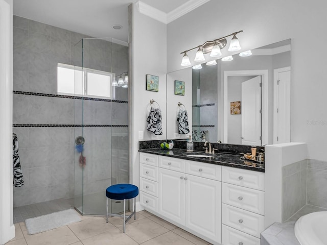 bathroom with vanity, shower with separate bathtub, tile patterned floors, and ornamental molding