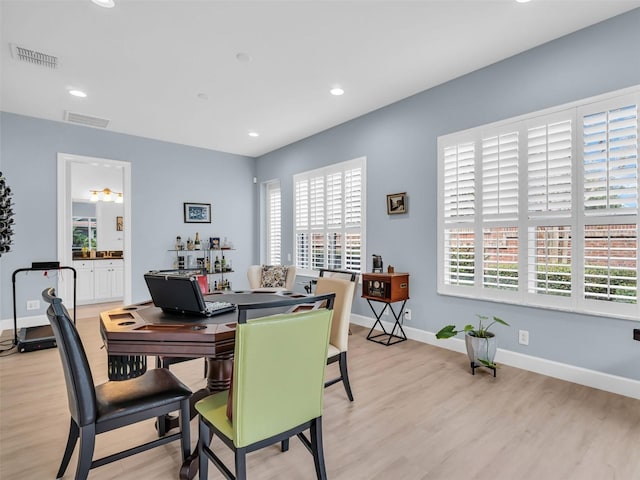 dining area with light wood-type flooring