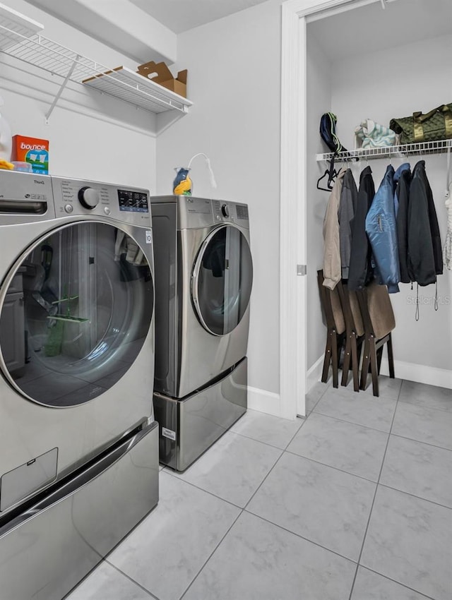 laundry room with washer and dryer