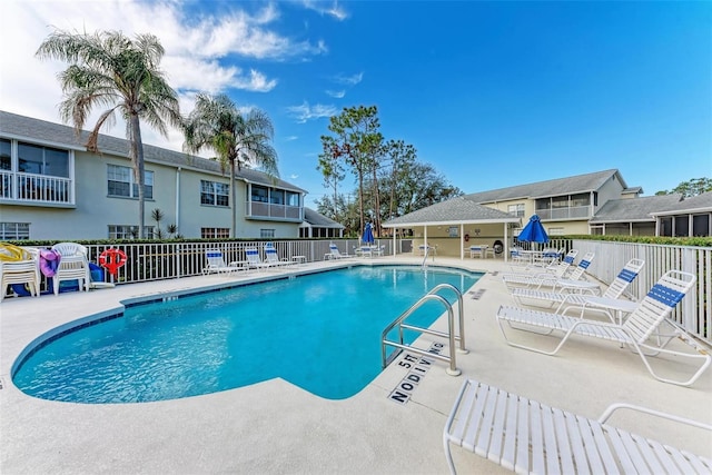 view of swimming pool featuring a patio area